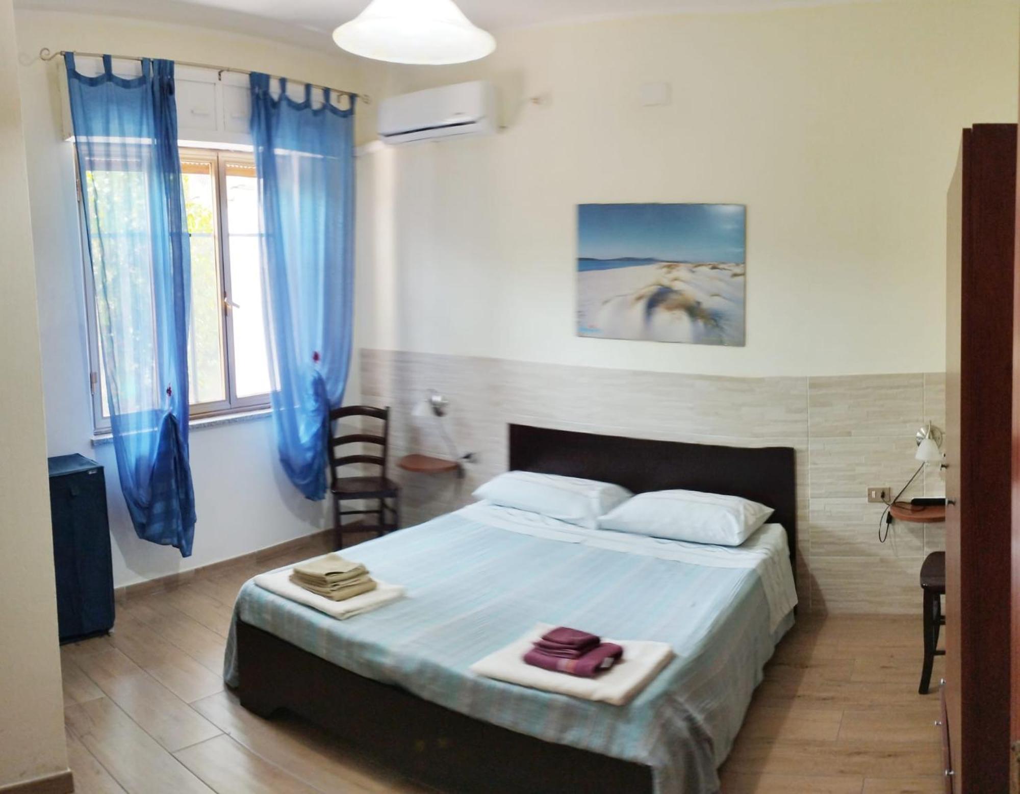 Casa Vacanze"Il Bouganville" Карбонія Екстер'єр фото